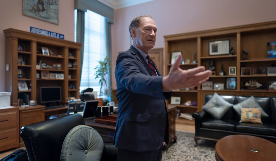 Associate Justice Samuel Alito stands in his chambers at the Supreme Court during an Associated Press interview, in Washington, Tuesday, Sept. 29, 2026. (AP Photo/J. Scott Applewhite)
