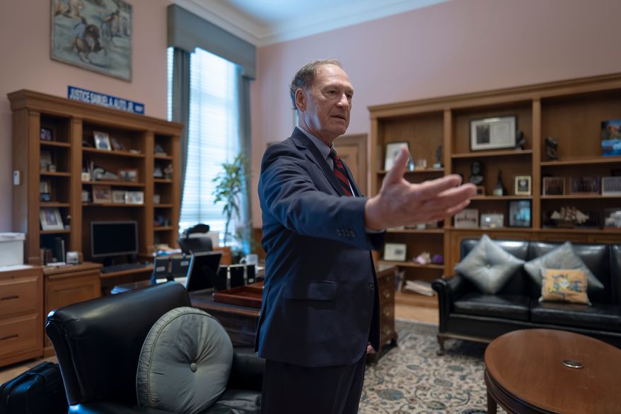 Associate Justice Samuel Alito stands in his chambers at the Supreme Court during an Associated Press interview, in Washington, Tuesday, Sept. 29, 2026. (AP Photo/J. Scott Applewhite)