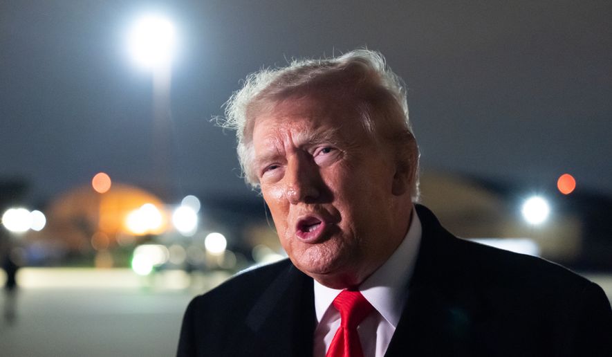 President Donald Trump speaks with reporters as he arrives on Air Force One, Saturday, Oct. 10, 2026, at Joint Base Andrews, Md. (AP Photo/Alex Brandon)