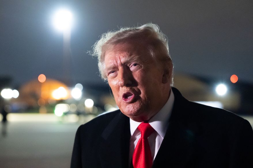 President Donald Trump speaks with reporters as he arrives on Air Force One, Saturday, Oct. 10, 2026, at Joint Base Andrews, Md. (AP Photo/Alex Brandon)