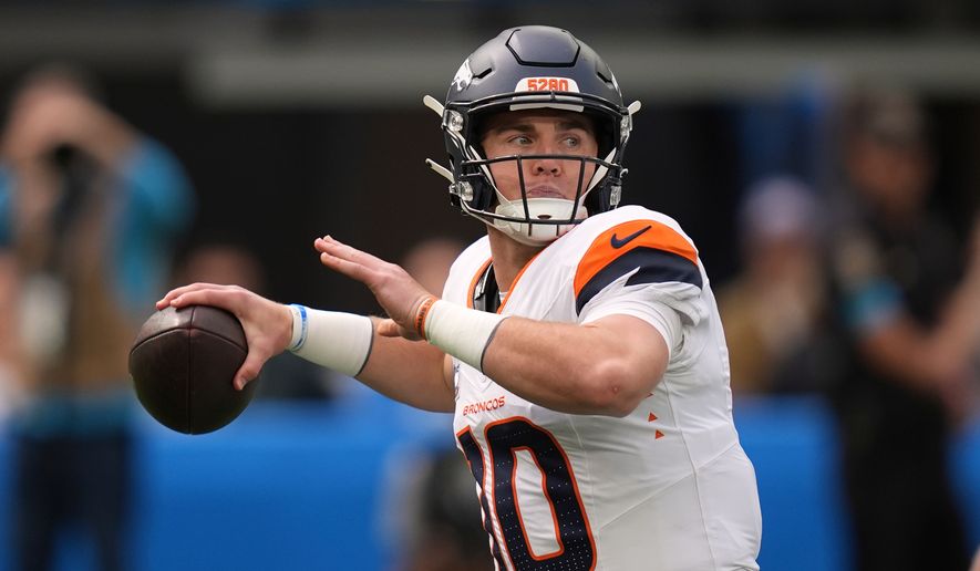 Denver Broncos quarterback Bo Nix passes during the first half of an NFL football game against the Los Angeles Chargers, Sunday, Oct. 11, 2026, in Inglewood, Calif. (AP Photo/Gregory Bull) ** FILE **
