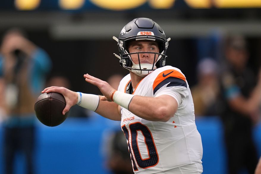 Denver Broncos quarterback Bo Nix passes during the first half of an NFL football game against the Los Angeles Chargers, Sunday, Oct. 11, 2026, in Inglewood, Calif. (AP Photo/Gregory Bull) ** FILE **