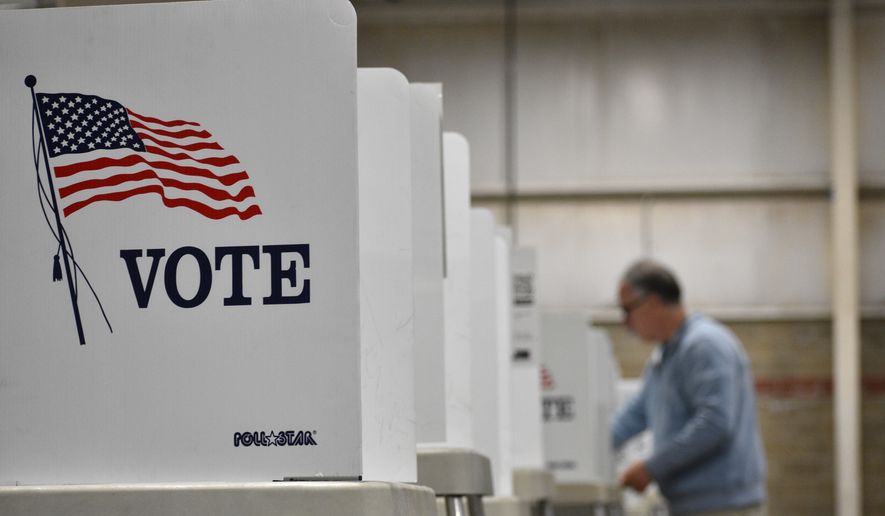 A voting booth is seen at Yellowstone County's MetraPark in Billings, Montana, on June 2, 2026. (AP Photo/Matthew Brown) **FILE**