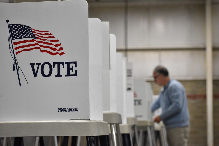 A voting booth is seen at Yellowstone County's MetraPark in Billings, Montana, on June 2, 2026. (AP Photo/Matthew Brown) **FILE**