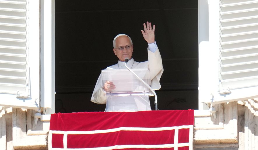 Pope Leo XIV delivers the Angelus prayer in St. Peter's Square at the Vatican, Sunday, Oct. 11, 2026. (AP Photo/Gregorio Borgia)