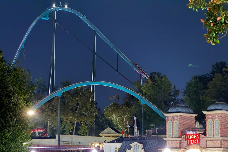 A roller coaster is shown at Six Flags over Georgia on Monday, Oct. 12, 2026 in Austell, Ga. (AP Photo/Emily Megnien)