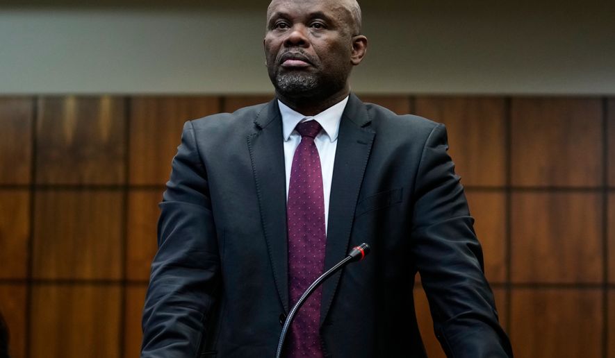 A suspended South Africa's Deputy National Police Commissioner for Crime Detection, Lt Gen Shadrack Sibiya, appears for his bail hearing at the Randburg Magistrate's Court, in Johannesburg, South Africa, Tuesday, Sept. 29, 2026. (AP Photo/Themba Hadebe)