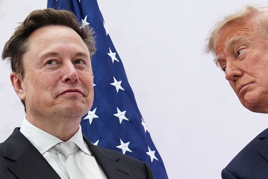 President Donald Trump, right, presents the National Medal of Science to Elon Musk at the U.S. Institute of Peace, Thursday, Oct. 8, 2026, in Washington. (AP Photo/Julia Demaree Nikhinson) **FILE**