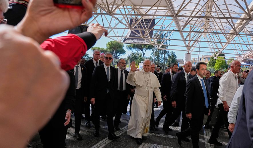 Pope Leo XIV arrives at the Agostino Gemelli Polyclinic in Rome on Tuesday, Oct. 13, 2026, where doctors expect to remove a lung nodule. (AP Photo/Alessandra Tarantino)