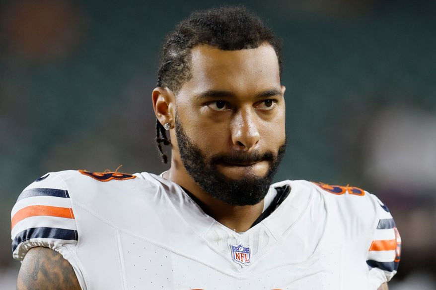 FILE - Chicago Bears defensive lineman Montez Sweat leaves the field after an NFL preseason football game against the Cincinnati Bengals in Cincinnati, Aug. 22, 2026. (AP Photo/Jay LaPrete, File)