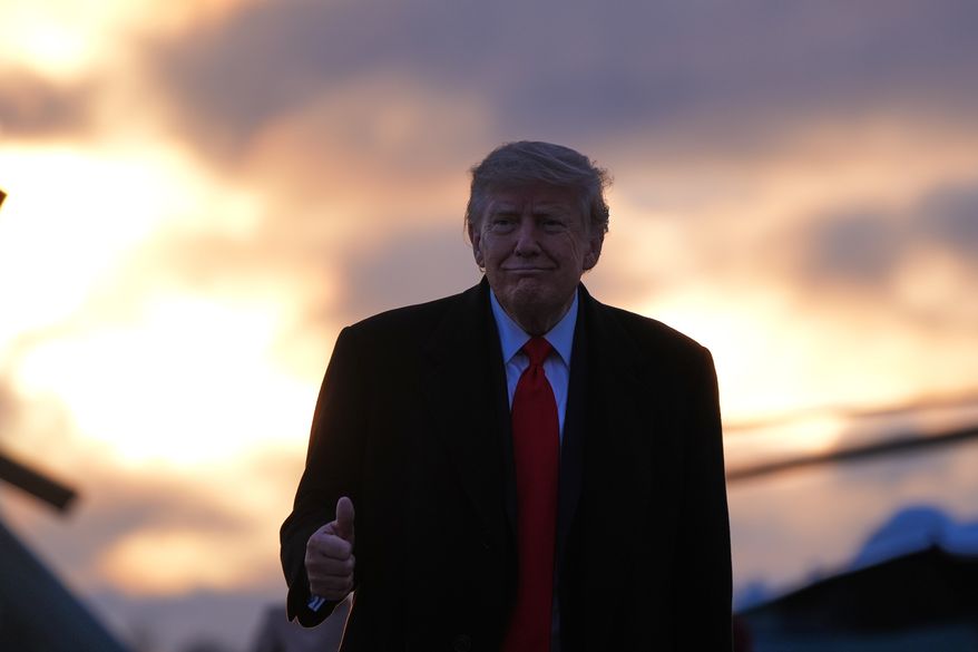 President Donald Trump boards Air Force One, Tuesday, Oct. 13, 2026, at Joint Base Elmendorf-Richardson, Alaska. (AP Photo/Alex Brandon)