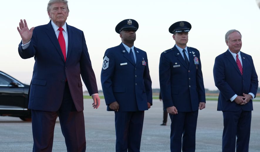 President Donald Trump arrives on Air Force One at Youngstown Air Reserve Station, in Youngstown, Ohio, Monday, Oct. 12, 2026. (AP Photo/Jacquelyn Martin)
