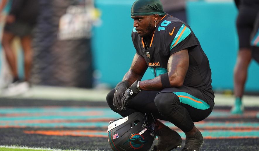 Miami Dolphins wide receiver Tyreek Hill sits in the end zone before an NFL football game against the New York Jets in Miami Gardens, Fla., on Sept. 29, 2025. (AP Photo/Rebecca Blackwell) **FILE**