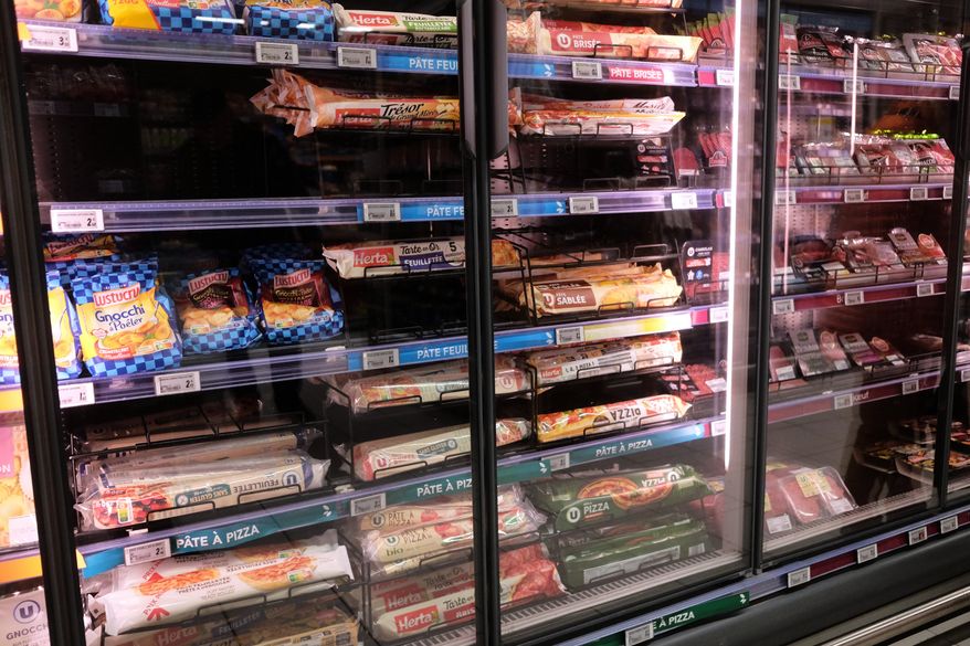 A view of a refrigerator two days after the cyberattack on several French supermarkets in Montreuil, France, Wednesday, Oct. 14, 2026. (AP Photo/Teresa Suarez)