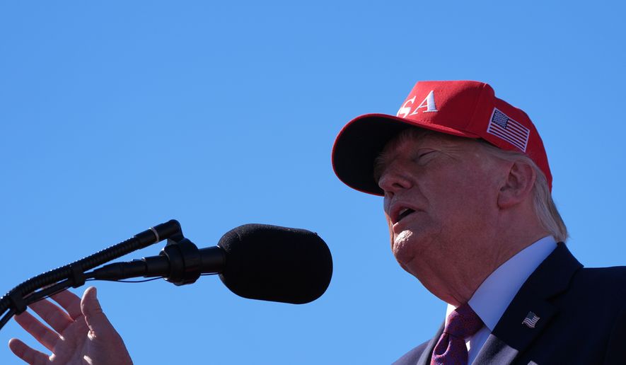 President Donald Trump speaks at a campaign rally at Laughlin Bullhead International Airport, Wednesday, Oct. 14, 2026, in Bullhead, Ariz. (AP Photo/Alex Brandon)