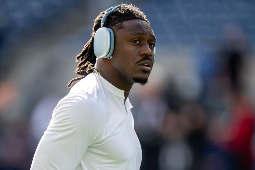 New England Patriots wide receiver A.J. Brown looks on during warmups before an NFL football game against the Seattle Seahawks, Wednesday, Sept. 9, 2026, in Seattle. (AP Photo/Stephen Brashear, File)