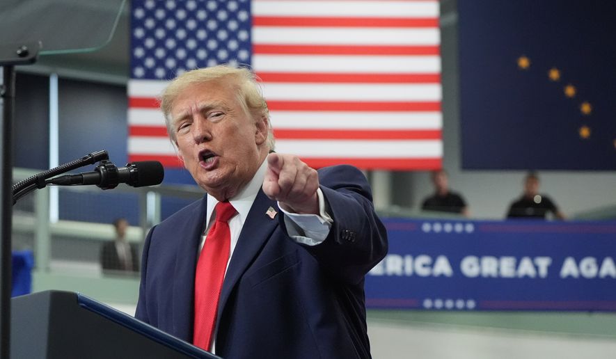 President Donald Trump speaks at a campaign rally at the Curtis D. Menard Memorial Sports Center, Tuesday, Oct. 13, 2026, in Wasilla, Alaska. (AP Photo/Alex Brandon)
