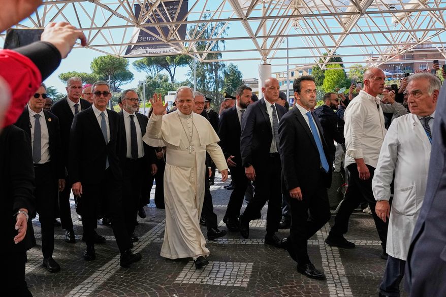 Pope Leo XIV arrives at the Agostino Gemelli Polyclinic in Rome, Tuesday, Oct. 13, 2026, where he's expected to be operated to remove a lung nodule. (AP Photo/Alessandra Tarantino)