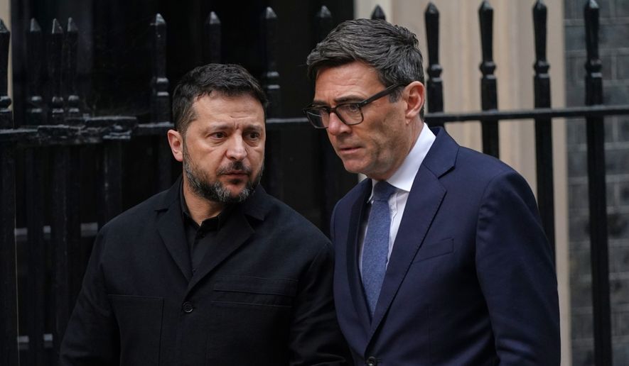 Britain's Prime Minister Andy Burnham says goodbye to Ukraine's President Volodymyr Zelenskyy after their meeting at 10 Downing Street in London, Wednesday, Oct. 14, 2026.(AP Photo/Alberto Pezzali)