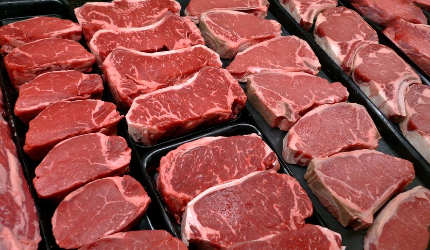 FILE - Steaks and other beef products are displayed for sale at a grocery store in McLean, Va., Jan. 18, 2010. (AP Photo/J. Scott Applewhite, File)