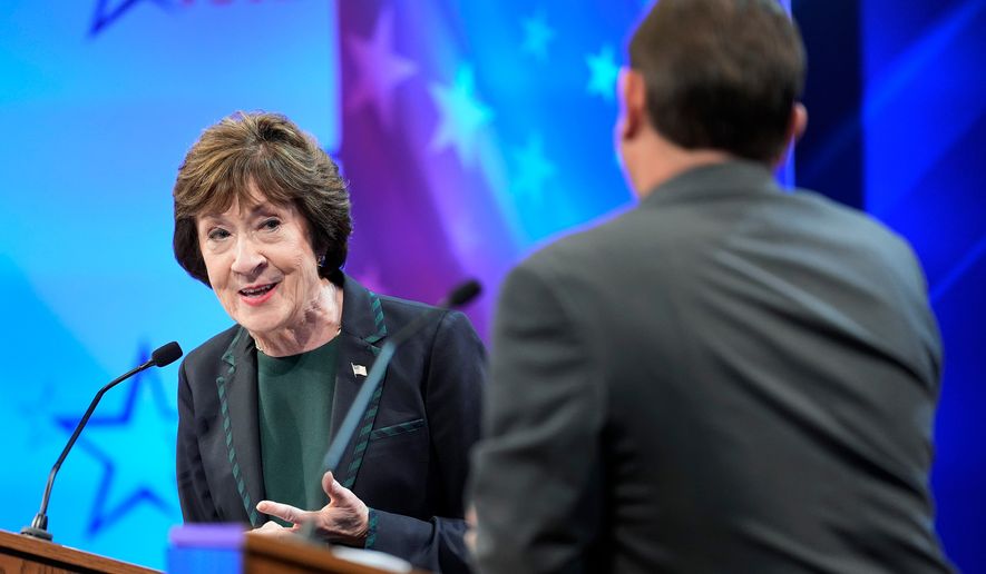 Sen. Susan Collins (R) looks to Troy Jackson (D) as he answers a question during the final Maine U.S. Senate debate in Bangor, Maine, on Thursday, Oct. 15, 2026. (Gregory A. Rec/Portland Press Herald via AP, Pool)