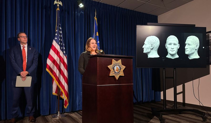 In this photo made with a smartphone, Clark County Coroner Melanie Rouse talks about of the victim whose remains were found in a barrel at Lake Mead, during a news conference in Las Vegas on Thursday, Oct. 15, 2026. (AP Photo/Jessica Hill)