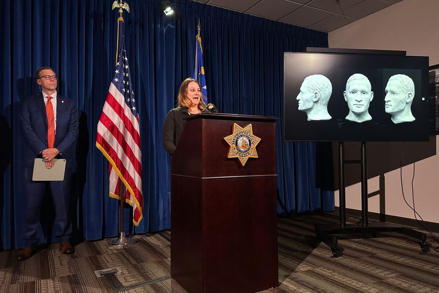 In this photo made with a smartphone, Clark County Coroner Melanie Rouse talks about of the victim whose remains were found in a barrel at Lake Mead, during a news conference in Las Vegas on Thursday, Oct. 15, 2026. (AP Photo/Jessica Hill)