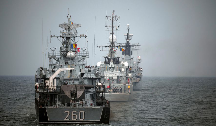 FILE - Romanian warships sail during a Romanian Navy led exercise outside Constanta, Romania, on April 16, 2024. (AP Photo/Andreea Alexandru, File)