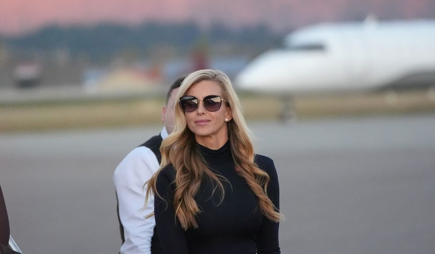 White House press secretary Katie Zacharia arrives with President Donald Trump at Glacier Park International Airport, Wednesday, Oct. 14, 2026, in Kalispell, Mont. (AP Photo/Alex Brandon)