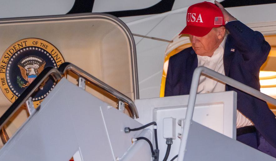 President Donald Trump arrives on Air Force One, Thursday, Oct. 15, 2026, at Joint Base Andrews, Md. (AP Photo/Alex Brandon)