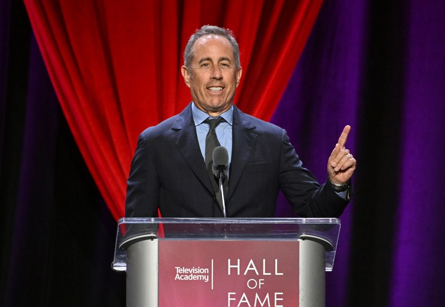 Jerry Seinfeld introduces honoree Ted Sarandos at the 28th Television Academy Hall of Fame on Thursday, Aug. 13, 2026 at the JW Marriott L.A. LIVE in Los Angeles. (Photo by Phil McCarten/Invision for the Television Academy/AP Content Services)