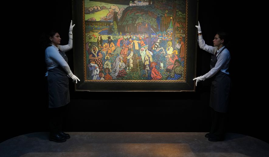 A painting by Wassily Kandinsky called 'Das bunte Leben, 1907' is displayed at Christie's auction rooms in London, Thursday, Oct. 8, 2026, estimate on request it will be for sale in the 20th/21st Century: London Evening Sale. (AP Photo/Kirsty Wigglesworth)