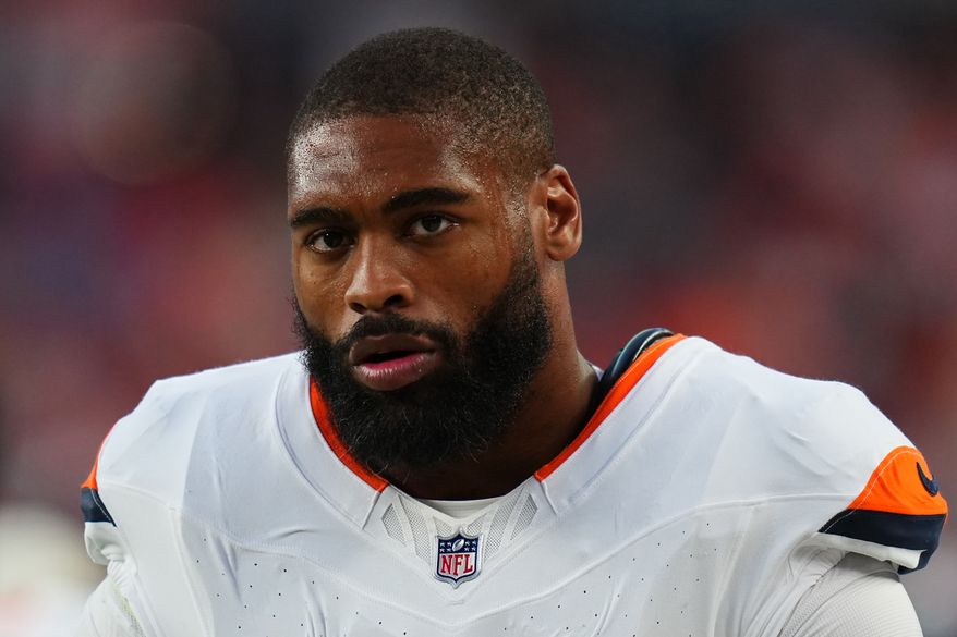 FILE - Denver Broncos linebacker Jonathon Cooper looks on during a preseason NFL football game against the Minnesota Vikings, Aug. 28, 2026, in Denver. (AP Photo/Jack Dempsey, File)