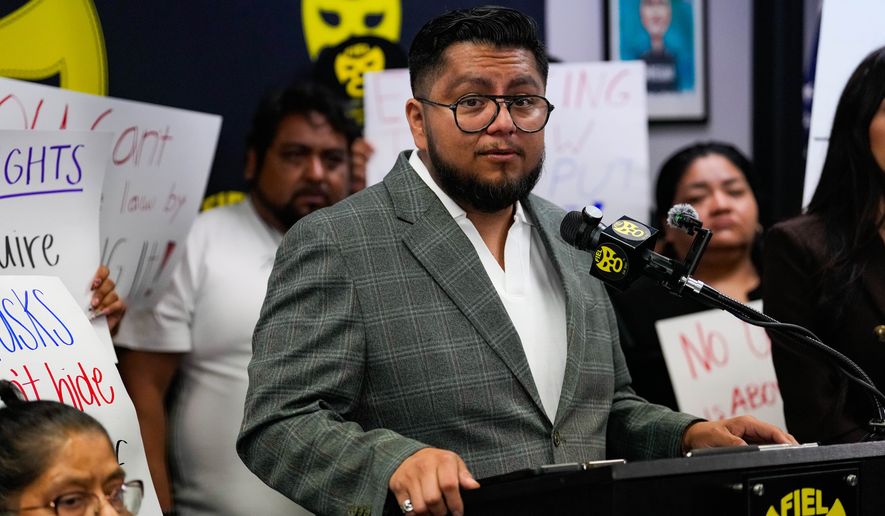 Cesar Espinosa of FIEL speaks during a news conference at FIEL headquarters in Houston on Friday, Oct. 16, 2026, disputing Immigration and Customs Enforcement's account of the Oct. 10 enforcement action that left Miguel Parra with a broken leg. (Raquel Natalicchio /Houston Chronicle via AP)