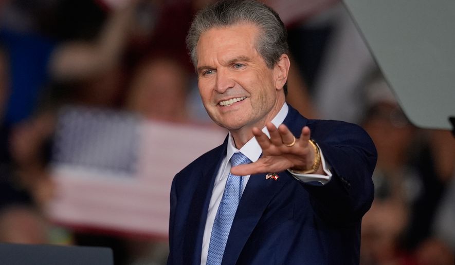 Georgia gubernatorial candidate Rick Jackson speaks before President Donald Trump arrives at a campaign rally at Dalton Municipal Airport, Friday, Oct. 16, 2026, in Dalton Ga. (AP Photo/Mike Stewart)