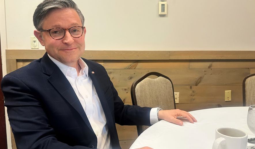 In this photo taken with a smart phone, House Speaker Mike Johnson sits for an AP interview during a campaign stop, Wednesday, Oct. 14, 2026, in Bangor, Maine. (AP Photo/Lisa Mascaro)