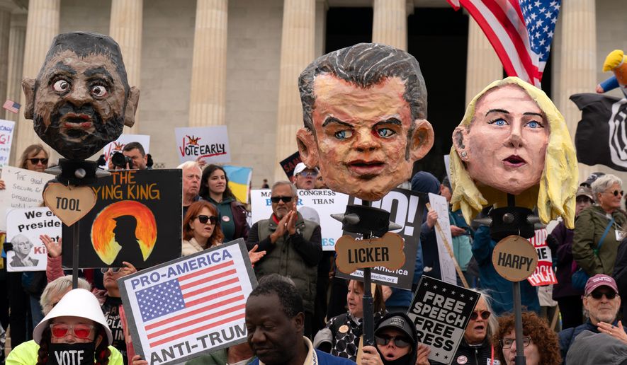 Demonstrators rally at the Lincoln Memorial during a "No Kings" protest in Washington, Saturday Oct. 17, 2026. (AP Photo/Jose Luis Magana)