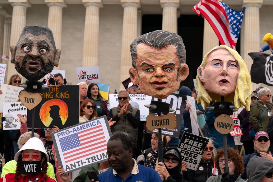 Demonstrators rally at the Lincoln Memorial during a "No Kings" protest in Washington, Saturday Oct. 17, 2026. (AP Photo/Jose Luis Magana)