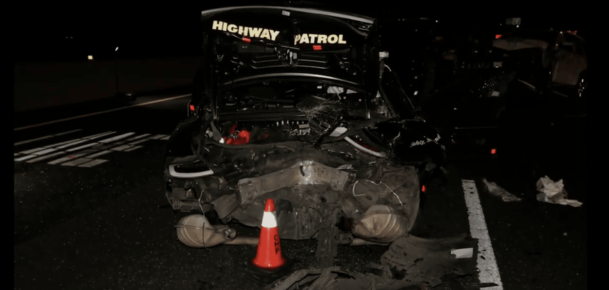 Two Solano CHP officers were injured when a Tesla struck their patrol vehicle on I-80 eastbound, despite flares, cones, and flashing emergency lights. (Credit: California Highway Patrol)