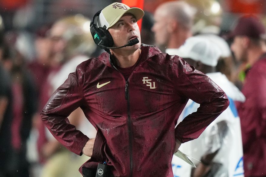 Florida State head coach Mike Norvell watches from the sideline during the first half of an NCAA college football game against Miami, Saturday, Oct. 17, 2026, in Miami Gardens, Fla. (AP Photo/Lynne Sladky)