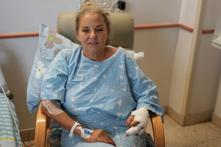 Washington Post photojournalist Heidi Levine receives treatment at Beilinson Hospital in Petah Tikva, Israel, Sunday, Oct. 18, 2026, after being injured in an attack by Israeli settlers while covering clashes that erupted during the Palestinian olive harvest in the West Bank village of Abu Falah on Friday. (AP Photo/Ariel Schalit)