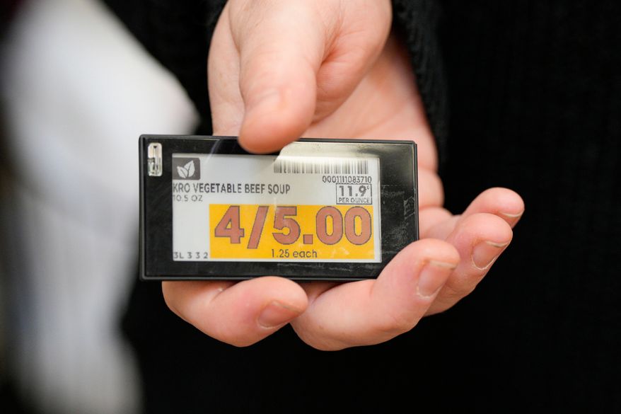 An electronic price tag is displayed at a Kroger grocery store Nov. 13, 2024, in Monroe, Ohio. (AP Photo/Jeff Dean, File)