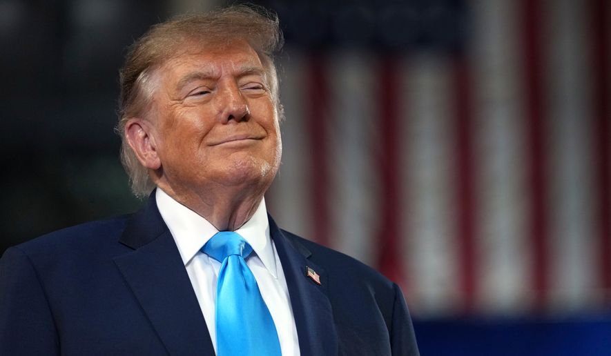 President Donald Trump arrives to speak at a campaign rally at Truist Arena at Northern Kentucky University, Saturday, Oct. 17, 2026, in Highland Heights, Ky. (AP Photo/Mark Schiefelbein)