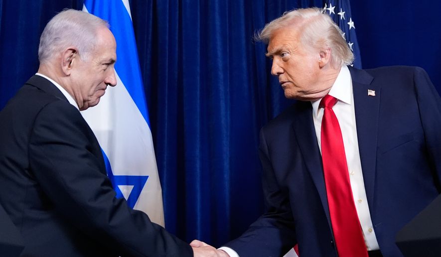 President Donald Trump shakes hands with Israel's Prime Minister Benjamin Netanyahu during a news conference at Mar-a-Lago, Dec. 29, 2025, in Palm Beach, Fla. (AP Photo/Alex Brandon, File)