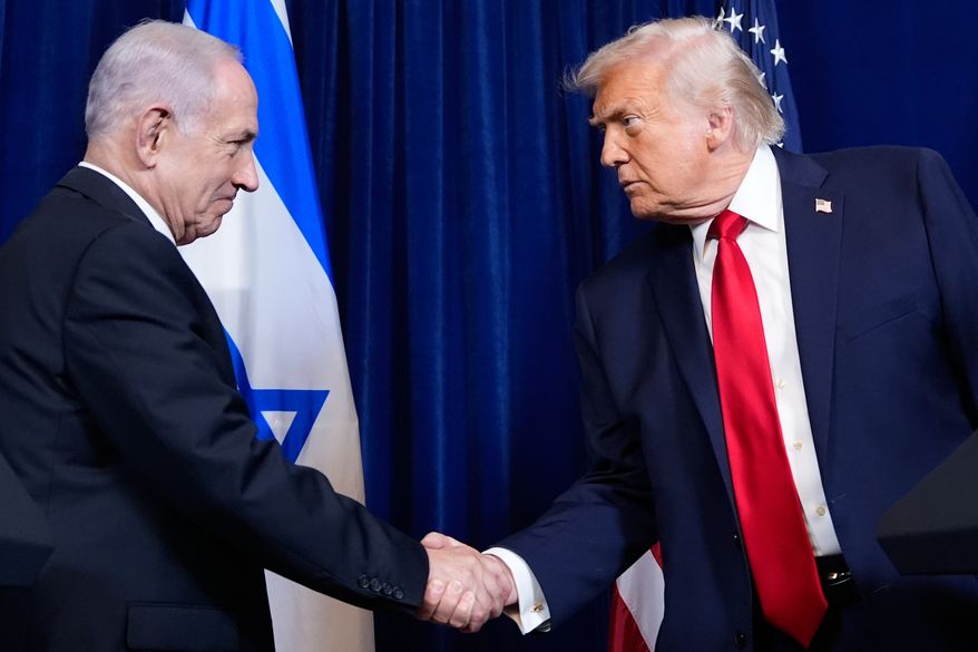 President Donald Trump shakes hands with Israel's Prime Minister Benjamin Netanyahu during a news conference at Mar-a-Lago, Dec. 29, 2025, in Palm Beach, Fla. (AP Photo/Alex Brandon, File)
