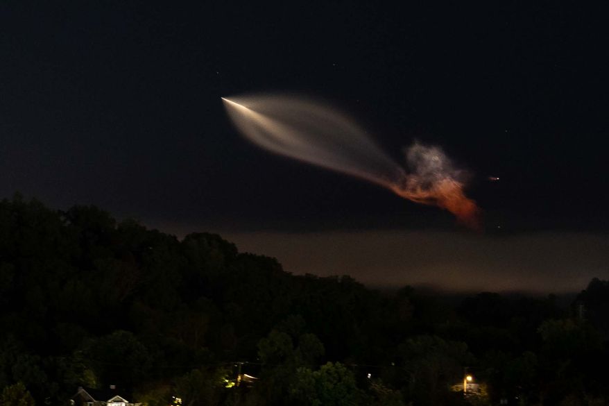 A SpaceX Falcon 9 rocket carrying supplies to the International Space Station is seen from Knoxville, Tenn., Tuesday, Oct. 13, 2026. (AP Photo/Camden Hall)