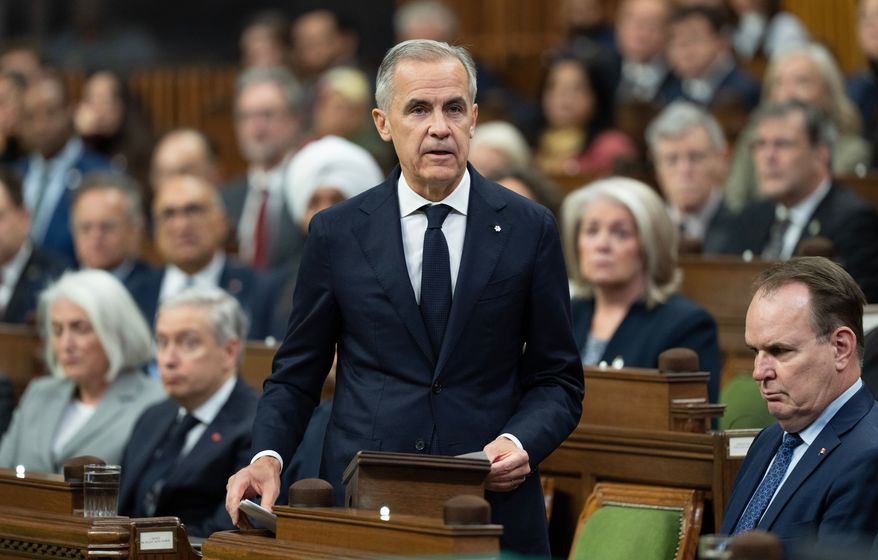 Canadian Prime Minister Mark Carney speaks about the incident at CFB Wainwright as he rises in the House of Commons in Ottawa, Monday, Oct. 19, 2026. (Adrian Wyld/The Canadian Press via AP)