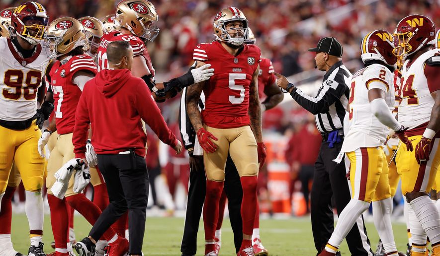 San Francisco 49ers wide receiver Mike Evans (5) reacts after a getting up from a play before walking off the field during the first half of an NFL football game against the Washington Commanders in Santa Clara, Calif., Monday, Oct. 19, 2026. (AP Photo/Kelley L. Cox)