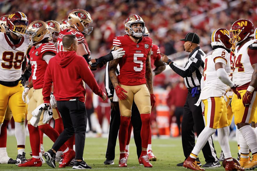 San Francisco 49ers wide receiver Mike Evans (5) reacts after a getting up from a play before walking off the field during the first half of an NFL football game against the Washington Commanders in Santa Clara, Calif., Monday, Oct. 19, 2026. (AP Photo/Kelley L. Cox)