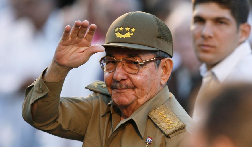 Cuba's acting President Raul Castro waves to journalists in front the Museum of the Revolution in Havana on March 13, 2007. (AP Photo/Javier Galeano, File)